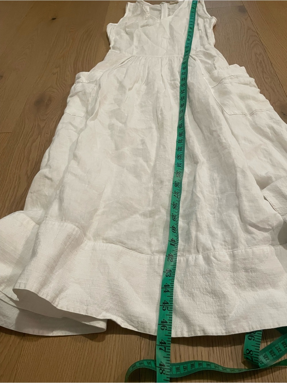 NAIF White Sleeveless V-Neck Linen Maxi Dress with Pockets - Picture 11 of 11
